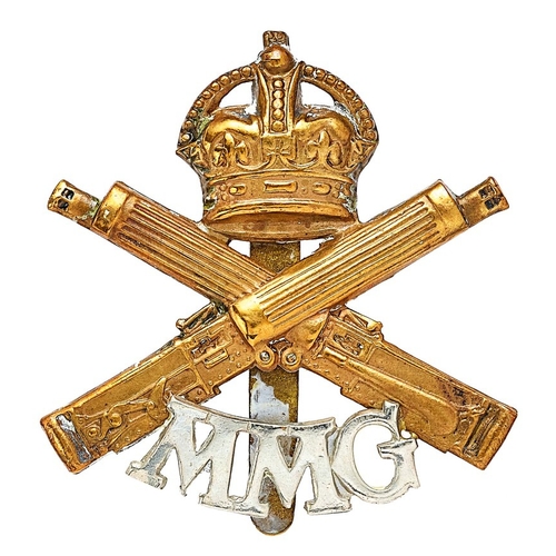 202 - Motor Machine Gun WW1 cap badge.  Good scarce die-stamped brass crowned crossed Vickers machine guns... 