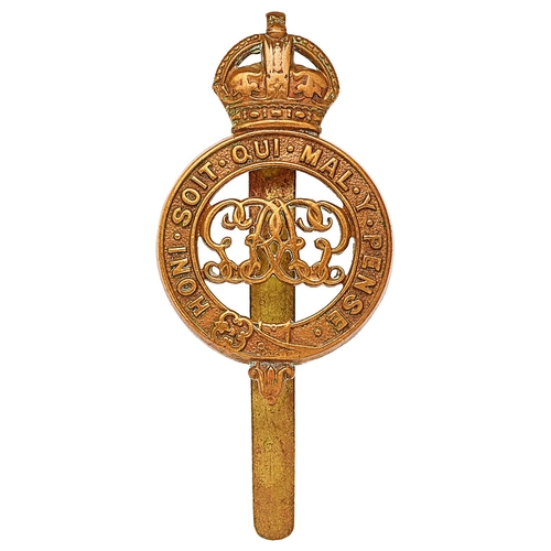 251 - Grenadier Guards GvR pagri badge circa 1911-35.  Good die-stamped brass crowned Garter; GR cypher, r... 