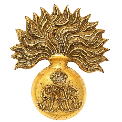 254 - Grenadier Guards GvR Sergeant cap badge circa 1910-35.  Good scarce die-stamped gilded brass flaming... 