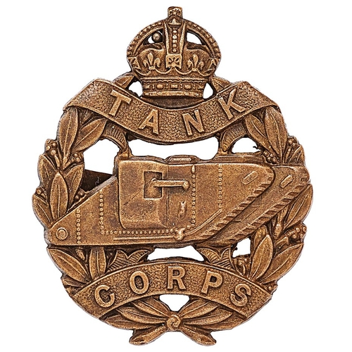 262 - Tank Corps WW1  OSD cap badge.  Good die-cast bronze crowned laurel sprays bearing title scrolls; ta... 