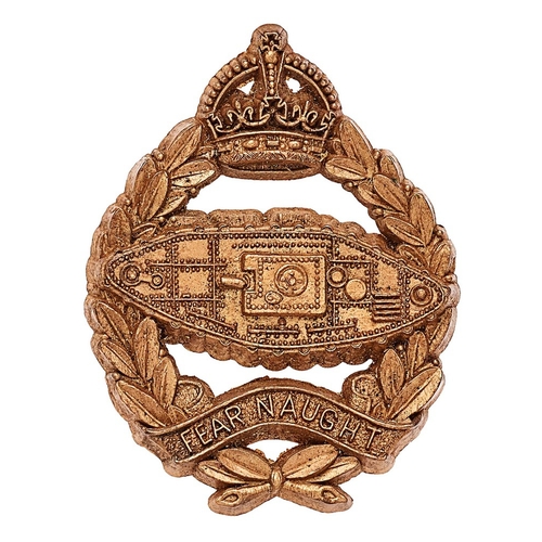 265 - Royal Tank Regiment WW2 plastic economy beret badge.  Good crowned laurel sprays bearing scroll insc... 