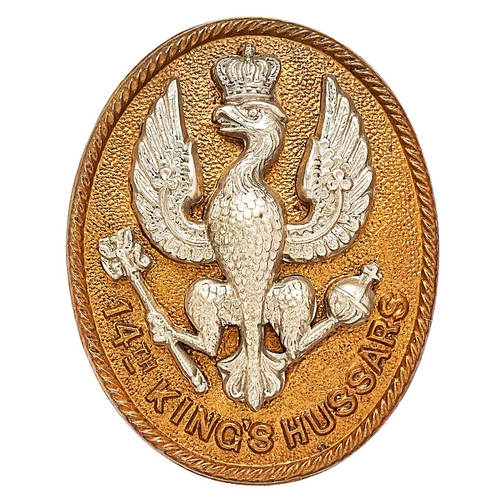 294 - 14th King's Hussars cap badge circa 1896-1915. Die-stamped. White metal eagle mounted on brass rope ... 