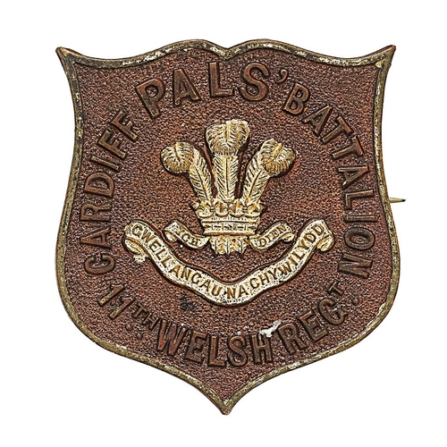 350 - 11th Bn. Welsh Regiment (Cardiff Pals) bronze badge. Very scarce bronze shield shaped example with s... 