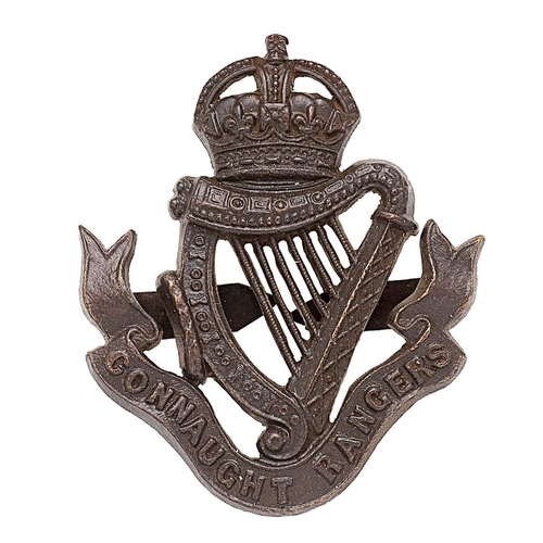 396 - Irish. Connaught Rangers OSD cap badge circa 1902-22.   A good scarce die-cast bronze crowned Harp r... 