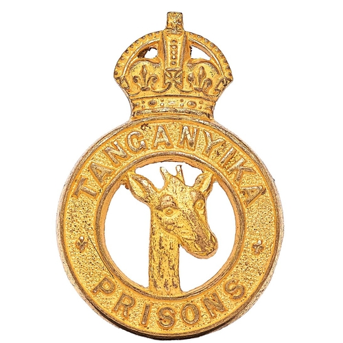 445 - Africa. Tanganyika Prisons Officer cap badge.  Good scarce British made die-cast rich gilt crowned t... 