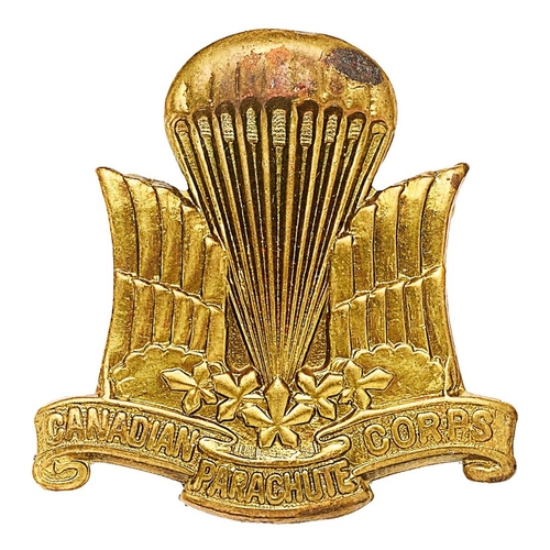 446 - Canadian Parachute Corps WW2 beret badge.  Good scarce die-stamped brass winged parachute and maple ... 