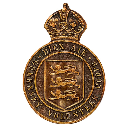 483 - Guernsey Volunteer Corps WW1 VTC lapel badge.  Scarce die-cast crowned circlet DIEX AIE GUERNSEY VOL... 