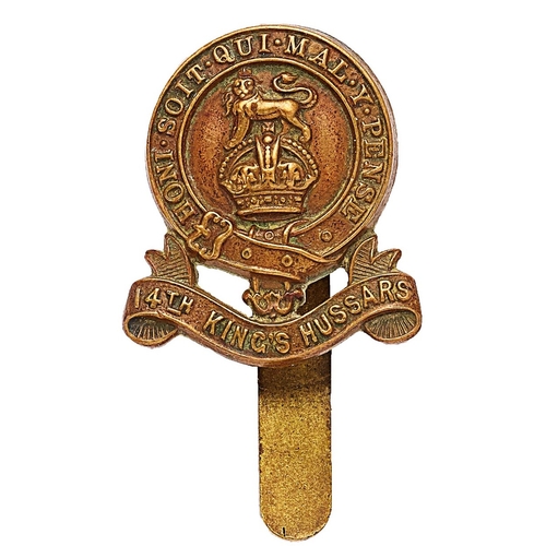 509 - 14th King's Hussars field service cap badge circa 1915-22 . Good die-stamped brass Garter on title s... 