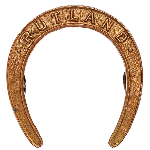 514 - Rutland Home Guard WW2 cap badge. Good scarce die-cast brass horseshoe inscribed RUTLAND. . Loops . ... 