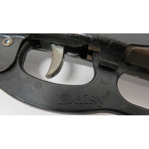 157 - Daisy Model 660 Toy Gun
blackened barrel and body with maker details.  Black composite, Winches... 