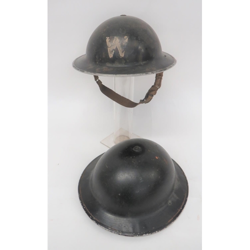 199 - Two WW2 Home Front Steel Helmets
consisting black paint exterior.  The front with white 