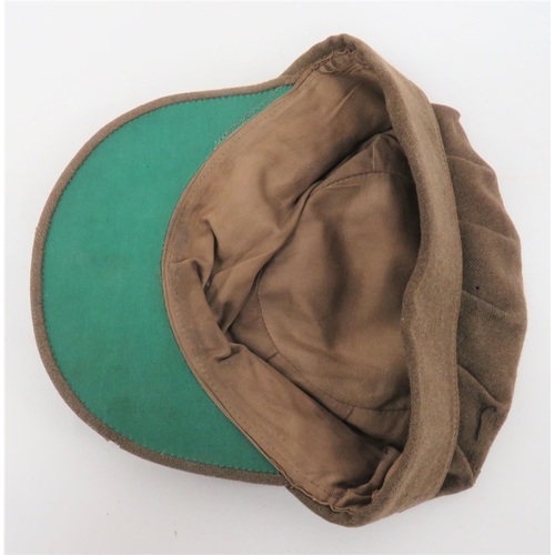 212 - WW2 ATC Service Dress Cap
fine woollen, khaki, soft crown.  Fold down rear and side flap.  ... 