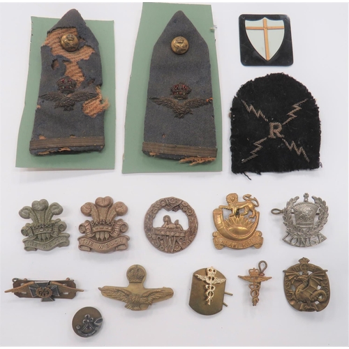 Small Selection of Various Badges
including 2 x plastic economy, WW2 The Welch (blades.  Slight difference in sizes ... Plastic, 8th Army formation badge ... WW2 plastic economy, SWB (blades absent) ... Pair bullion embroidery, KC RAF Pilot Officer shoulder straps (heavy moth) ... Silvered and gilt, RAF Padre collar badge ... Gilt, KC RAF F/S badge ... Brass Malawi Rifles cap badge.  15 items.