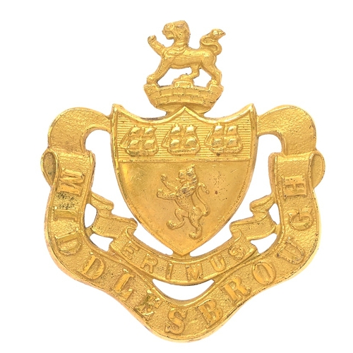 118 - Middlesbrough VTC WW1 gilt cap badge. Fine rare die-cast rich gilt crest and arms on ERIMUS resting ... 