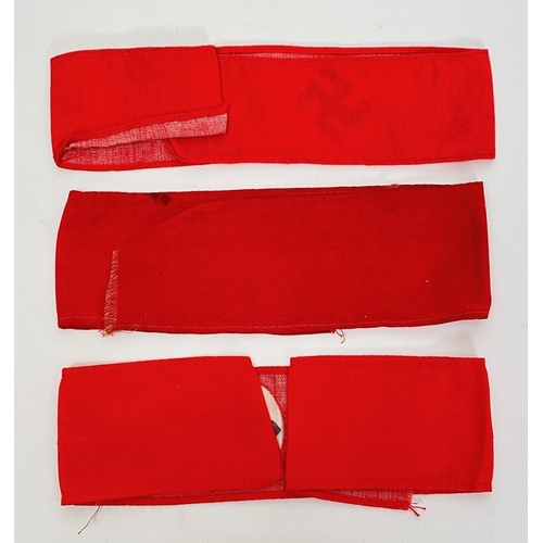 385 - German Third Reich 3 narrow NSDAP party member armbands.  Good red cotton bands printed with white d... 