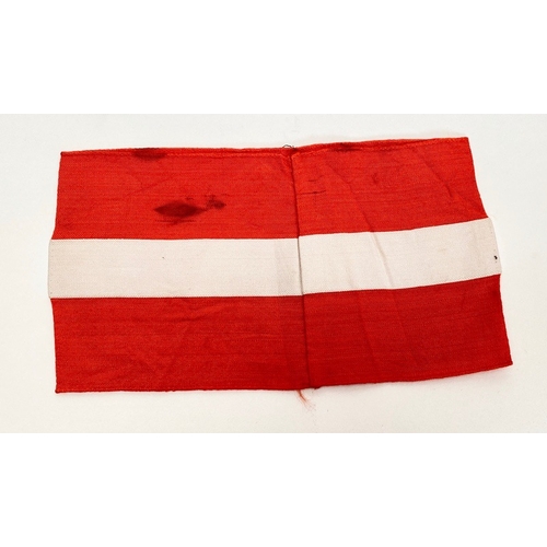 391 - German Third Reich. Hitler Youth armband.  Good red cotton band with applied central white line over... 