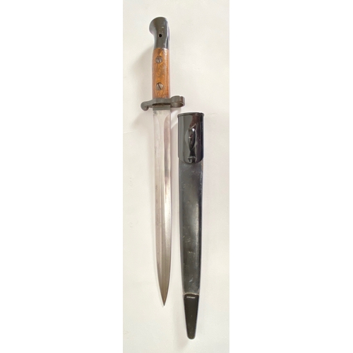3rd Bn Notts & Derby Regiment 1903 Pattern Bayonet.  This example with stamps to the forte of the blade 1903 Wilkinson. The pommel with issue stamp 3 N&DY. Housed in leather and steel mounted scabbard. Overall GC mounts to scabbard repainted.