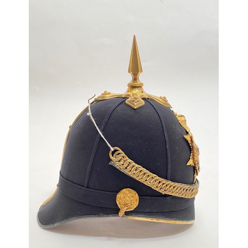 323 - Victorian Cheshire Regiment 1878 Pattern Officers Helmet. The helmet is complete with gilt metal fur... 