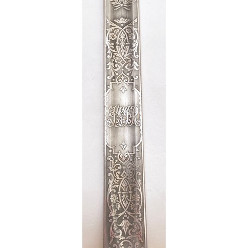 464 - RAMC Victorian Officer Sword By Wilkinson. The 32 inch blade is decorated with a crowned reverse ent... 