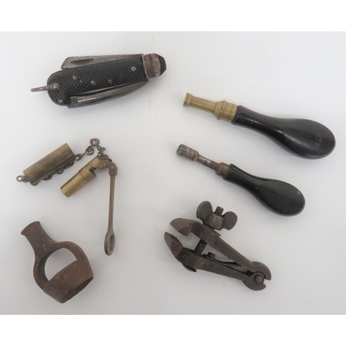 Small Selection of Gun Accessories
consisting steel mainspring clamp ... Steel wad pouch ... Steel nipple key with ebony handle ... Small brush holder with ebony handle ... WW1, brass bore mirror dated 1918 ... Military pattern Jack knife.  6 items.