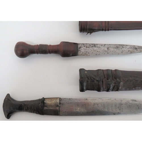 153 - Three Various African Knives
consisting Sudanese example.  10 inch, double edged blade with geo... 