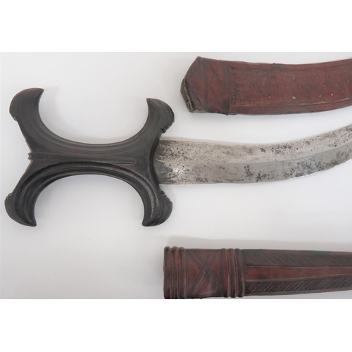 153 - Three Various African Knives
consisting Sudanese example.  10 inch, double edged blade with geo... 