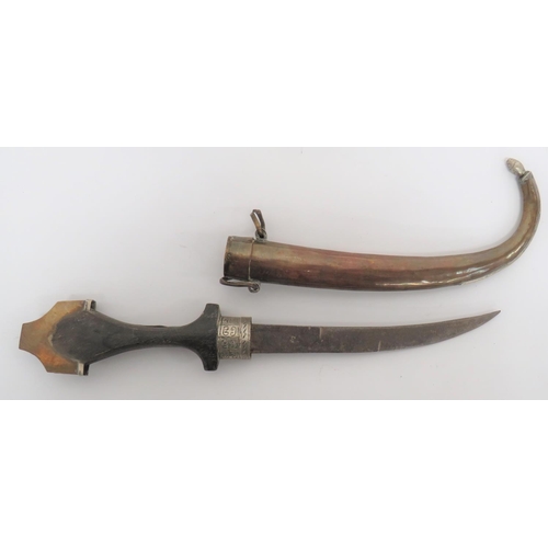 185 - Two North African Jambiyas
8 inch, double part edged, slightly curved blade.  White metal ferru... 