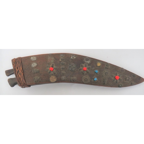 192 - Two Decorative KukriConsisting Mid 19th Century example contained in it wooden scabbard with ornate ... 