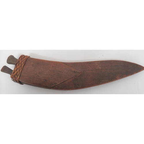 192 - Two Decorative KukriConsisting Mid 19th Century example contained in it wooden scabbard with ornate ... 