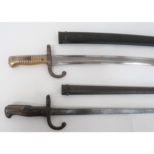 109 - Two French Bayonets
consisting chassepot bayonet.  22 1/2 inch, single edged, yataghan blade wi... 