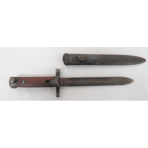 120 - WW2 Italian M1938 Carcano Bayonet
7 inch, single edged blade with fuller.  Steel, modified cros... 