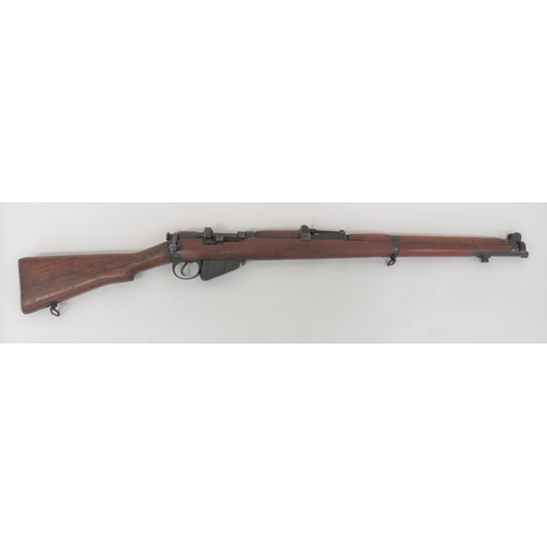 Deactivated British SMLE MKIII Issue Rifle
25 1/4 inch, .303 barrel.  Top mounted leaf sight.  Body stamped "BSA Co" redated 1916.  Action with side pull out magazine cut off (for single round firing).  Turn down bolt handle.  Blackened steel trigger guard and removable magazine.  Polished wooden butt with brass butt plate.  Three section front woodwork with conversion around the sight.  Blackened steel barrel band and nose cap.  Complete with current spec. certificate.