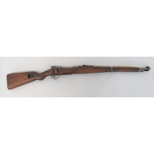Scarce Deactivated WW1 German KAR 98AZ Carbine
23 1/2 inch, 7.92 mm barrel.  Front eared sight.  Rear ladder sight.  Action with maker "Erfurt" dated 1914.  Turn down bolt handle.  Polished full stock woodwork and full length top hand guard.  Steel trigger guard and floor plate.  Steel butt plate.  Central steel band with fixed sling loop.  Hinged steel end cap.  Front bayonet lug.  Complete with current spec. certificate. 