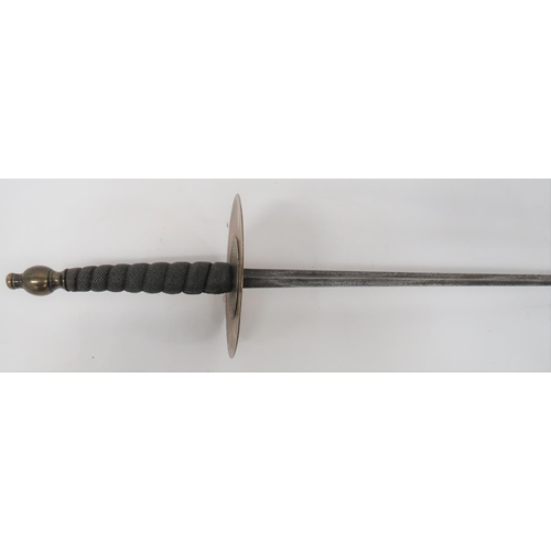 77 - Early 19th Century Fencing Sword
30 1/2 inch, hollow ground, trefoil blade.  Large, brass disk ... 