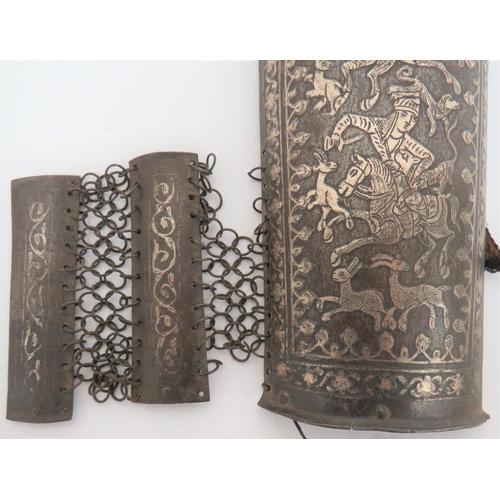 226 - 19th Century Indo- Persian Bazu Band Arm Protector
steel forearm protector elaborately etched and in... 