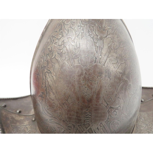 235 - Gothic Revival Etched Morion Helmet
high pointed crown with side edge rib.  One side with etche... 