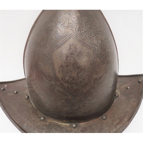 235 - Gothic Revival Etched Morion Helmet
high pointed crown with side edge rib.  One side with etche... 