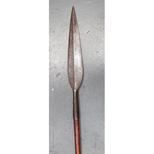 244 - Late 19th Century Zulu Throwing Spear
10 1/2 inch, double edged, leaf shape head.  Polished woo... 