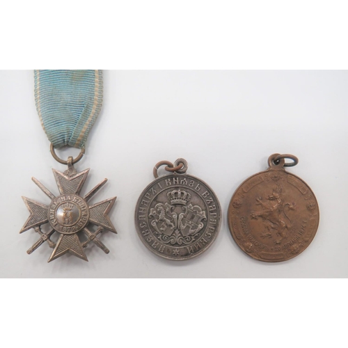 Bulgarian Medal Group
consisting silvered Soldier's Cross For Bravery, pre WW1 ... 25th Anniversary Of the April Insurrection 1876 ... Memory Of The Glorious 1885 Campaign.  3 items.