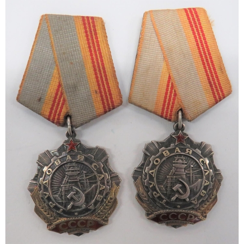 Two Soviet Order of Labour Glory Medals
2nd Class examples in silvered, gilt and enamel.  Soviet style ribbon bars.  Reverse with maker details and numbers "365350" and "105396".  2 items.