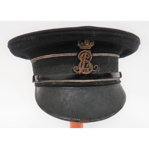 232 - Interesting Edwardian Officer's Peaked Dress Cap
black crown with silver gimp decorative circle. &nb... 