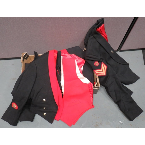 Senior NCO and Officer Mess Uniforms
including dark blue example with anodised, QC REME collars.  The right arm with Staff Sergeant rank ... Red waistcoat ... Black trousers with scarlet side lines ... Royal Artillery, dark blue example with red facing.  Right cuff with bullion embroidery, Warrant Officer rank.  Anodised, QC RA buttons ... Black trousers with red side lines ... REME Officer's scarlet example with black facings.  Gilt Lieutenant shoulder rank.  Silvered and gilt REME buttons ... Black mess waistcoat ... Royal Engineer Officer's  scarlet example with black facing .  Bullion embroidery flaming grenade collar badges.  Gilt buttons.  Quantity.