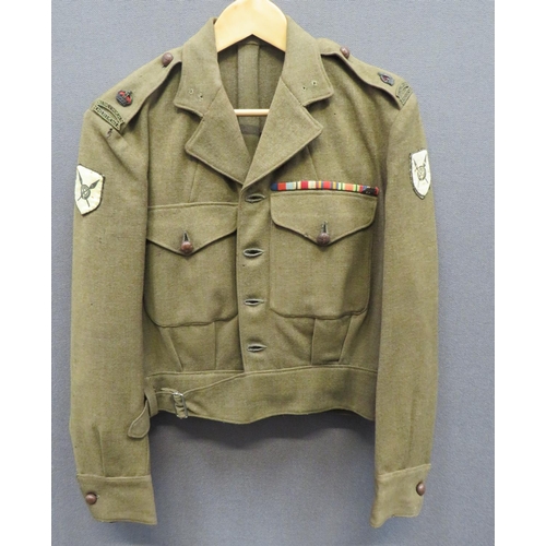 291 - 1940 Pattern Northern Rhodesia Officer's Battledress Jacket
khaki woollen, single breasted, converte... 