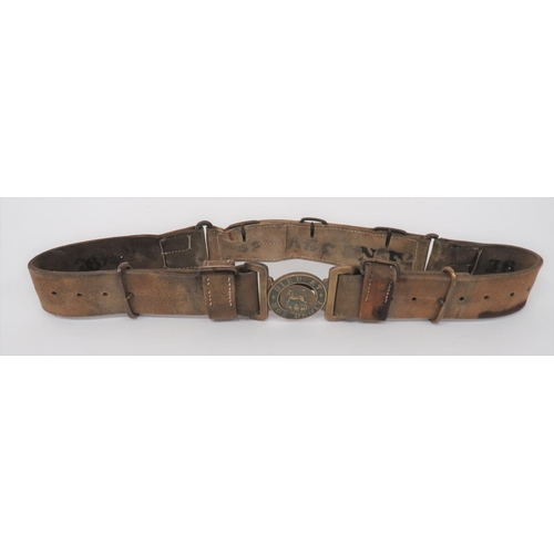 312 - Victorian P1888 Slade Wallace Belt
buff leather, three section belt.  The rear section with thr... 