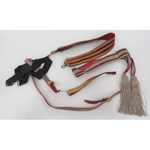 315 - Officer's Sash and Sword Belt
silver and red line embroidery belt with two hanging silver wire tasse... 