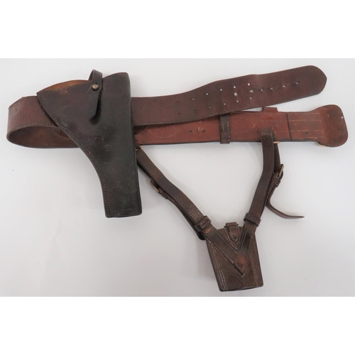 Officer's Sam Browne Belt and 1908 Pattern Holster
brown leather, Sam Browne belt with brass fittings.  Complete with brown leather sword frog.  Now fitted with a dark brown leather, open top, Webley service revolver holster.  The rear with brass, 1908 pattern, belt hook and the centre cut to accommodate the Sam Browne belt.  