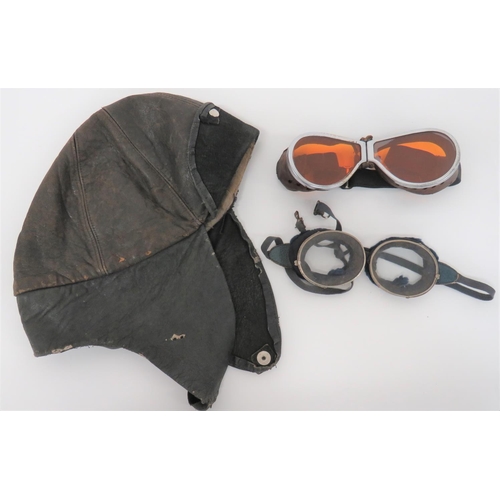 351 - Interwar Flying/Driving Leather Helmet and Goggles
black leather, six panel crown with lower ear sec... 