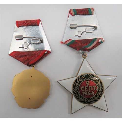 111 - Bulgaria Order Of George Dimitrov
gilt and enamel medal complete in fitted box with matching lapel b... 