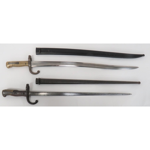 97 - Two French Bayonets
consisting chassepot bayonet.  22 1/2 inch, single edged, yataghan blade wi... 