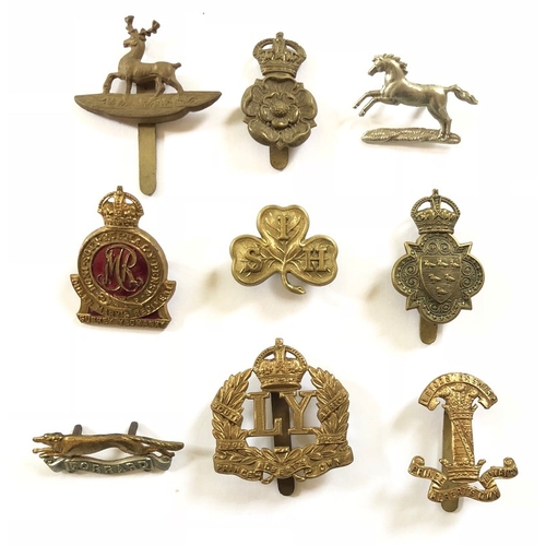 Yeomanry Regiments. 9 various cap badges.   Hertfordshire ... Yorkshire Dragoons ... Northamptonshire ... Surrey (enamelled) ... South Irish Horse ... Sussex ... East Riding ... Leicestershire (1908-16) ... Leicestershire (1916-22).  All complete with fixings. (9 items)